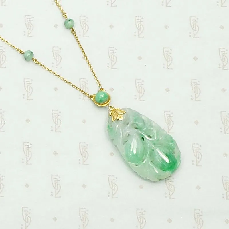 Carved Jade Plum Pendant on Decorative Gold Chain