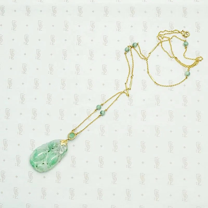 Carved Jade Plum Pendant on Decorative Gold Chain