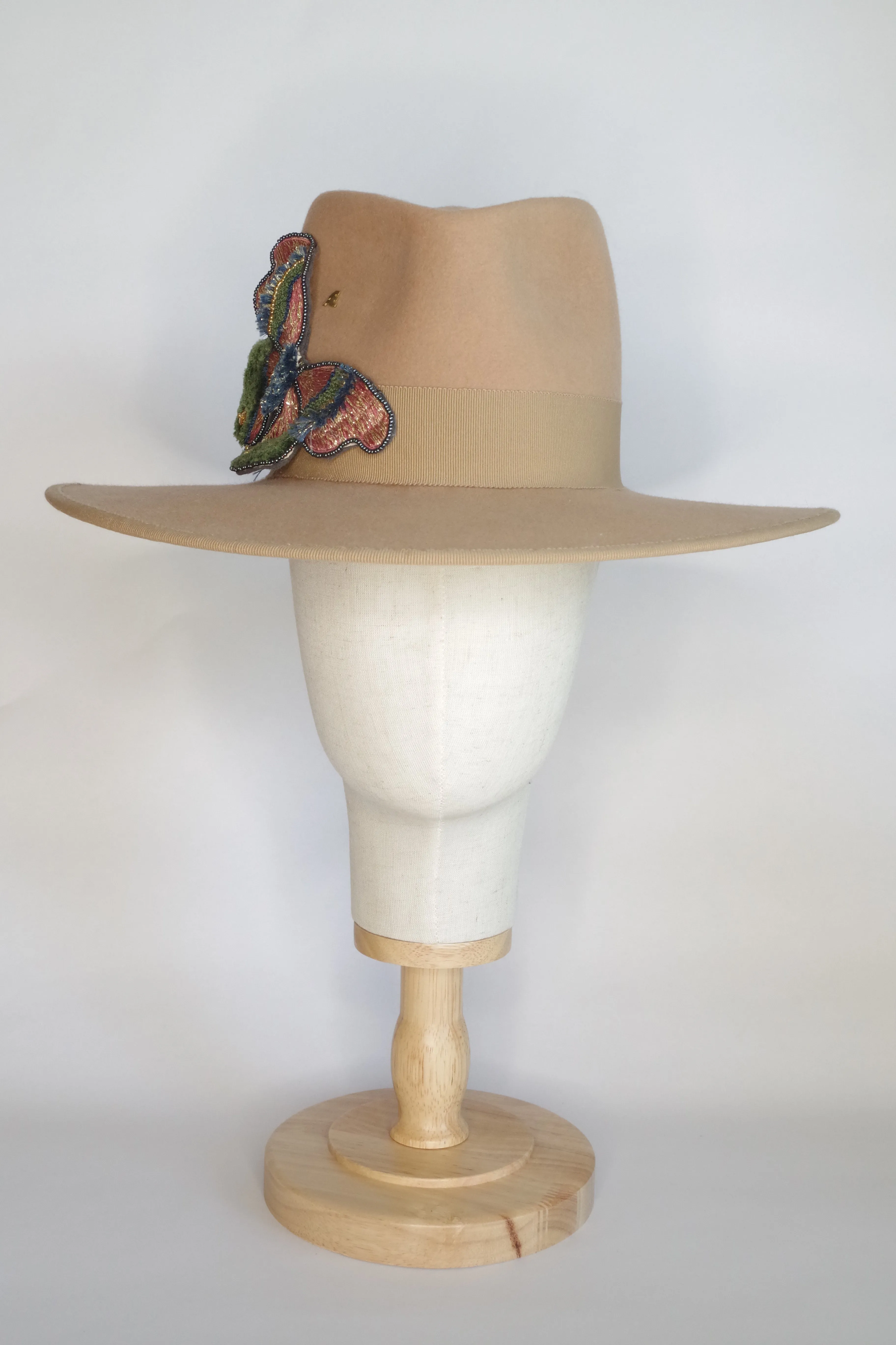 Fedora with a striking brooch