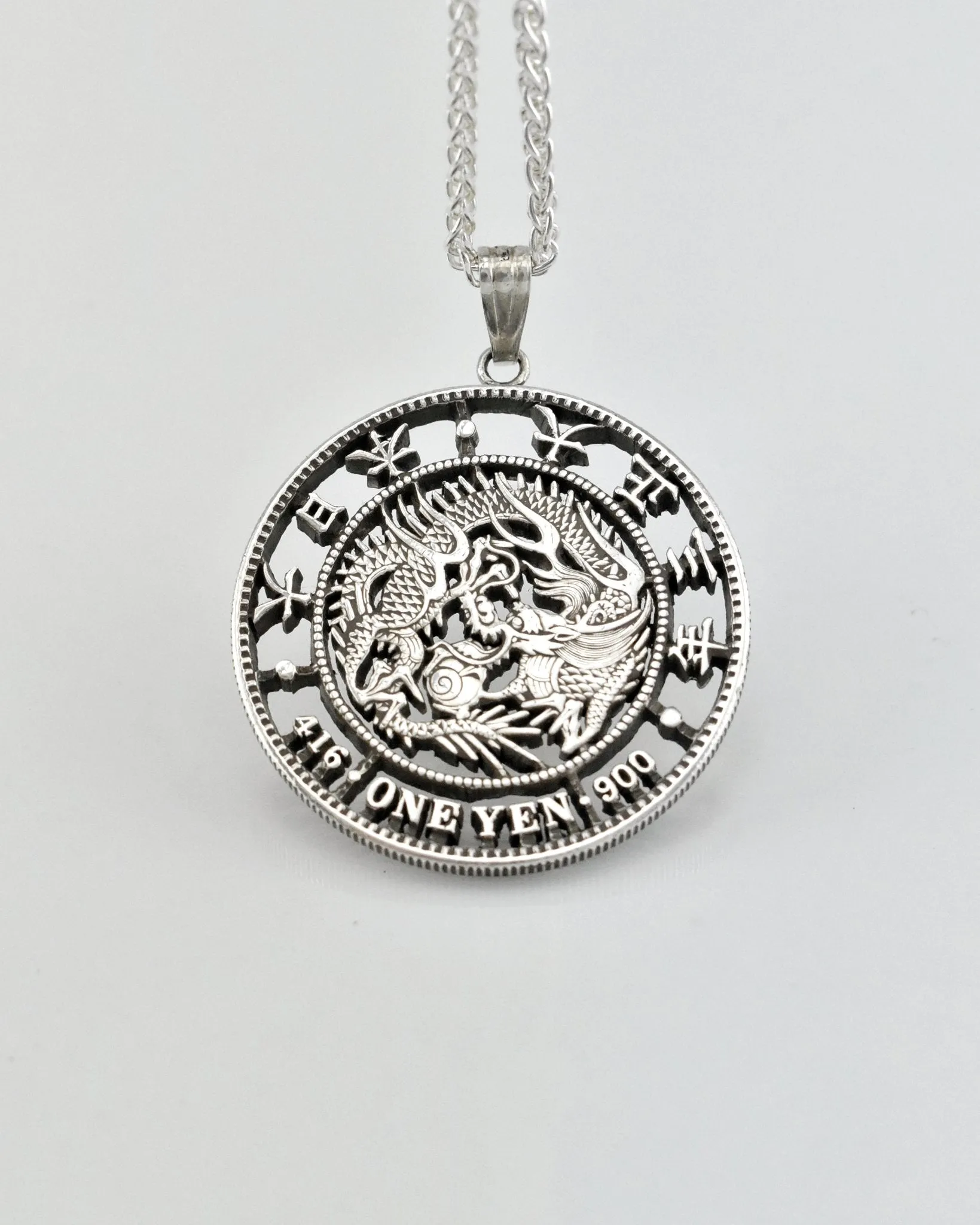 Japan - One Yen Dragon Cut Coin Pendant